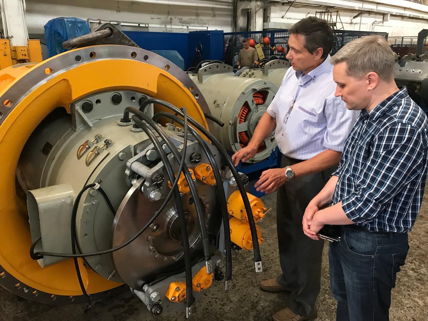 Igor Davydov with BELAZ-HOLDING colleague